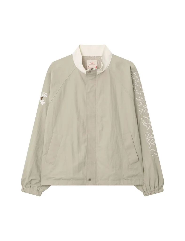 이우트 (EEUT) ARCHIVE EMBROIDERED TRACK JUMPER / BEIGE