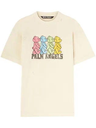 크림 반팔 티셔츠. 가슴에 컬러 곰 네 마리가 겹친 그래픽과 PALM ANGELS 레터링